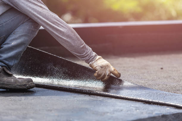 Professional Emergency Waterproofing technician working in Martinsburg, OH